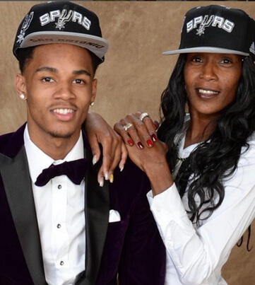 Dejounte Murray with his mother.